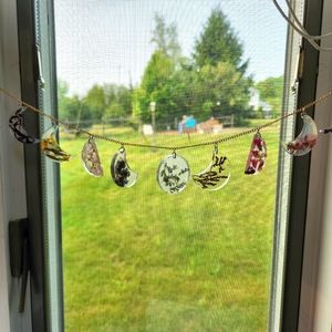 Pressed flowers moon phases sun catcher
